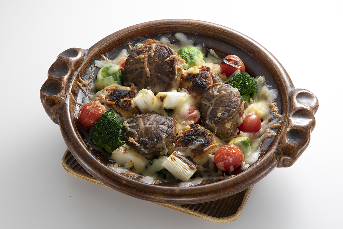 チーズをかけた一番採り生どんこの肉詰め西京焼き